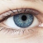 Blue eye Macro. Children's eye close-up