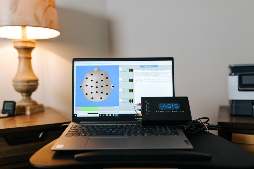 Image of IASIS Microcurrent Neurofeedback Machine in the office of Authentic Brain Soltuions