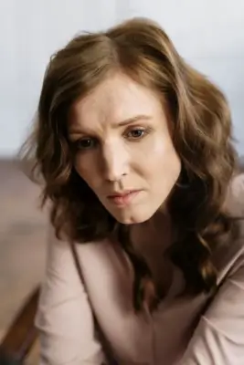 Woman sitting and looking sad